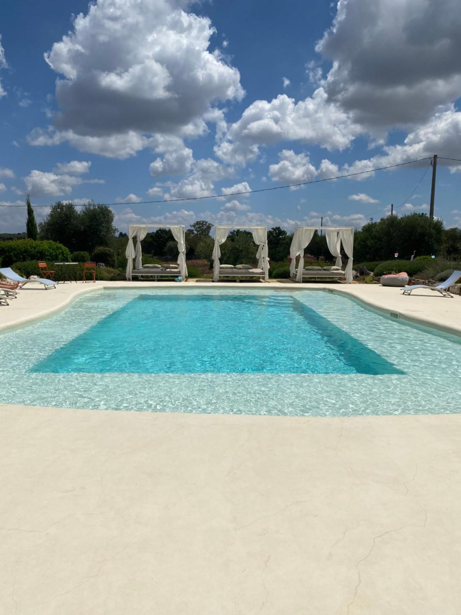 I Trulli Di Alice Villa เชจลีเมสซาปิกา ภายนอก รูปภาพ
